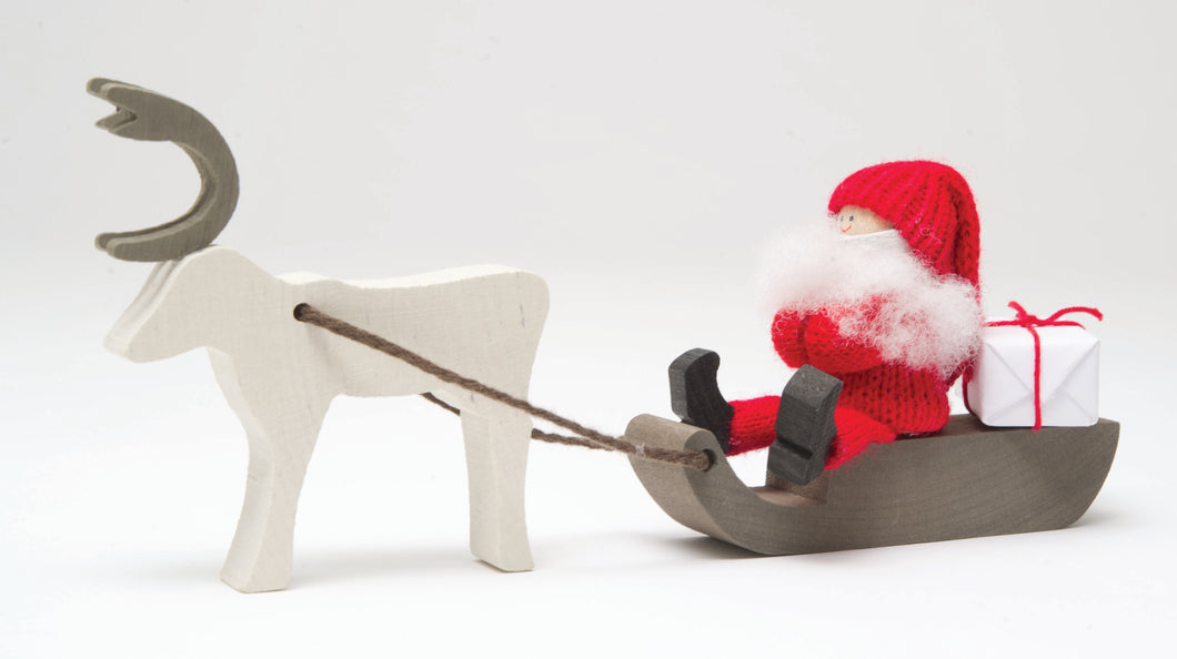 Santa On Sled With Reindeer