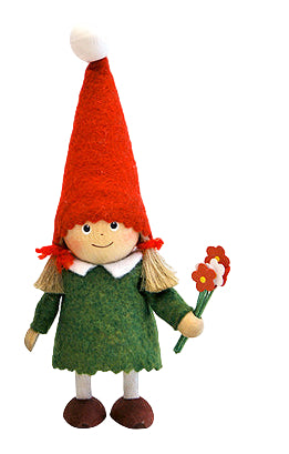 Gnome figurine with a red hat and green outfit holding a flower on a white background